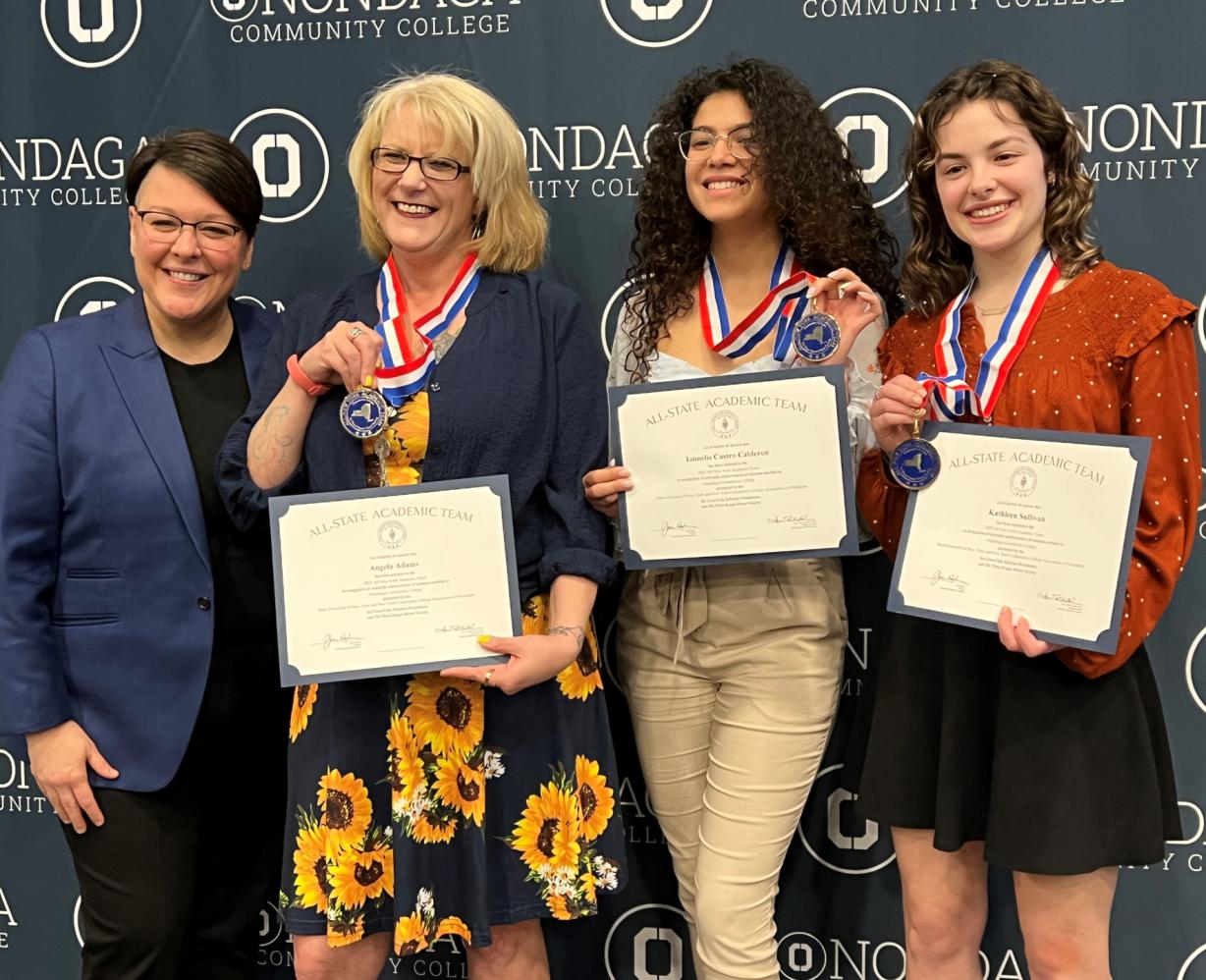 OCC's contingent at the PTK All-State ceremony include (left to right) Faculty Advisor Dr. Annie Tuttle, Angela Adams, Iannelis Castro Calderon, and Katie Sullivan.