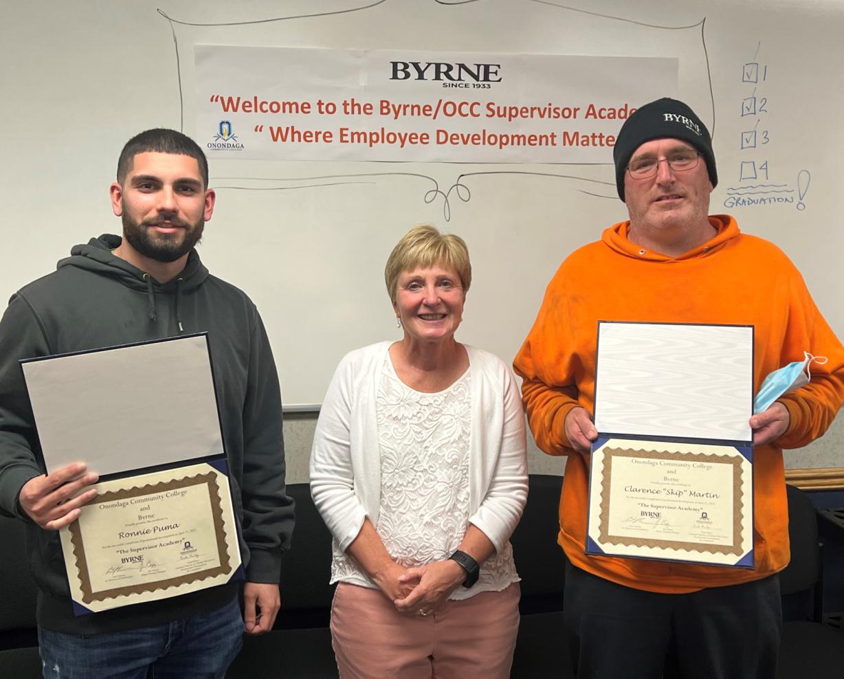 Ronnie Puma (left) and Skip Martin (right) are the first Byrne Dairy employees to complete the Supervisor Academy. They are pictured with OCC's Enid Reiley (center). Ronnie Puma (left) and Skip Martin (right) are the first Byrne Dairy employees to complete the Supervisor Academy. They are pictured with OCC's Enid Reiley (center).