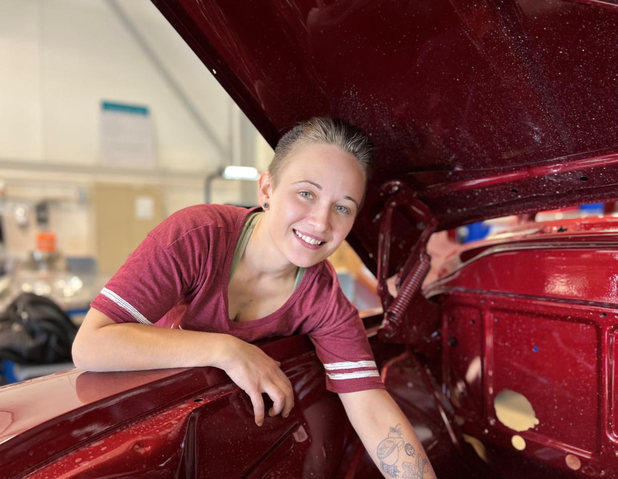 Claire Sears will complete her Automotive Technology degree in May. She's pictured in the Automotive Technology lab working on the 57 Chevy pickup truck students are restoring.
