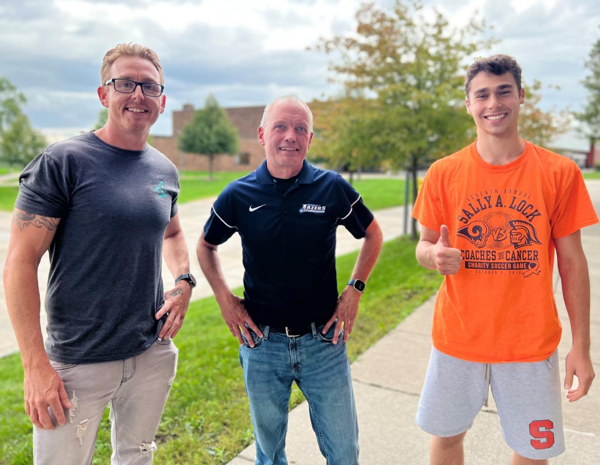 The 2022 edition of the Lazers Cross Country team includes (left to right) 40-year-old freshman Michael Lavalle, Head Coach Rob Colvin, and Dylan Sweeney. We have a conversation with them on our podcast, "Chatting About College."