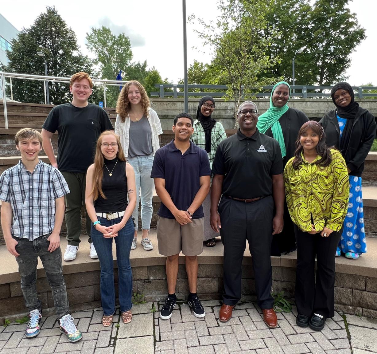 Student Government Officers (front row, left to right) Darian Barber, Siobhan Young, Chris Cedano Alcala, OCC President Dr. Warren Hilton, and Thuw J-Elmi. Back row (left to right): Eddie Flynn, Hannah Durand, Sabirin Hassan, Yasmin Hassan, Zaineb Aden.