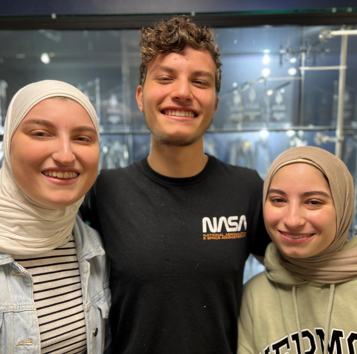 Yasmine (left), Mohamad (center), and Farah (right) Chatila are triplets who came to the United States from Lebanon less than a year ago. Last month they were all inducted into the Phi Theta Kappa Honor Society.