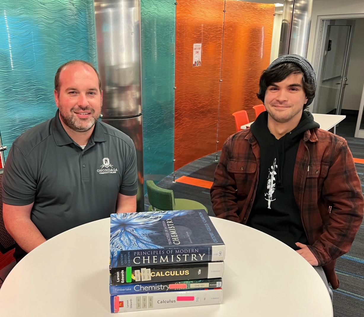 Students can take part in workshops and receive free tutoring through the Learning Center 7 days a week! Pictured are (left to right) Learning Center Director Ted Mathews and student Nick Chai who tutors Chemistry and Calculus there.