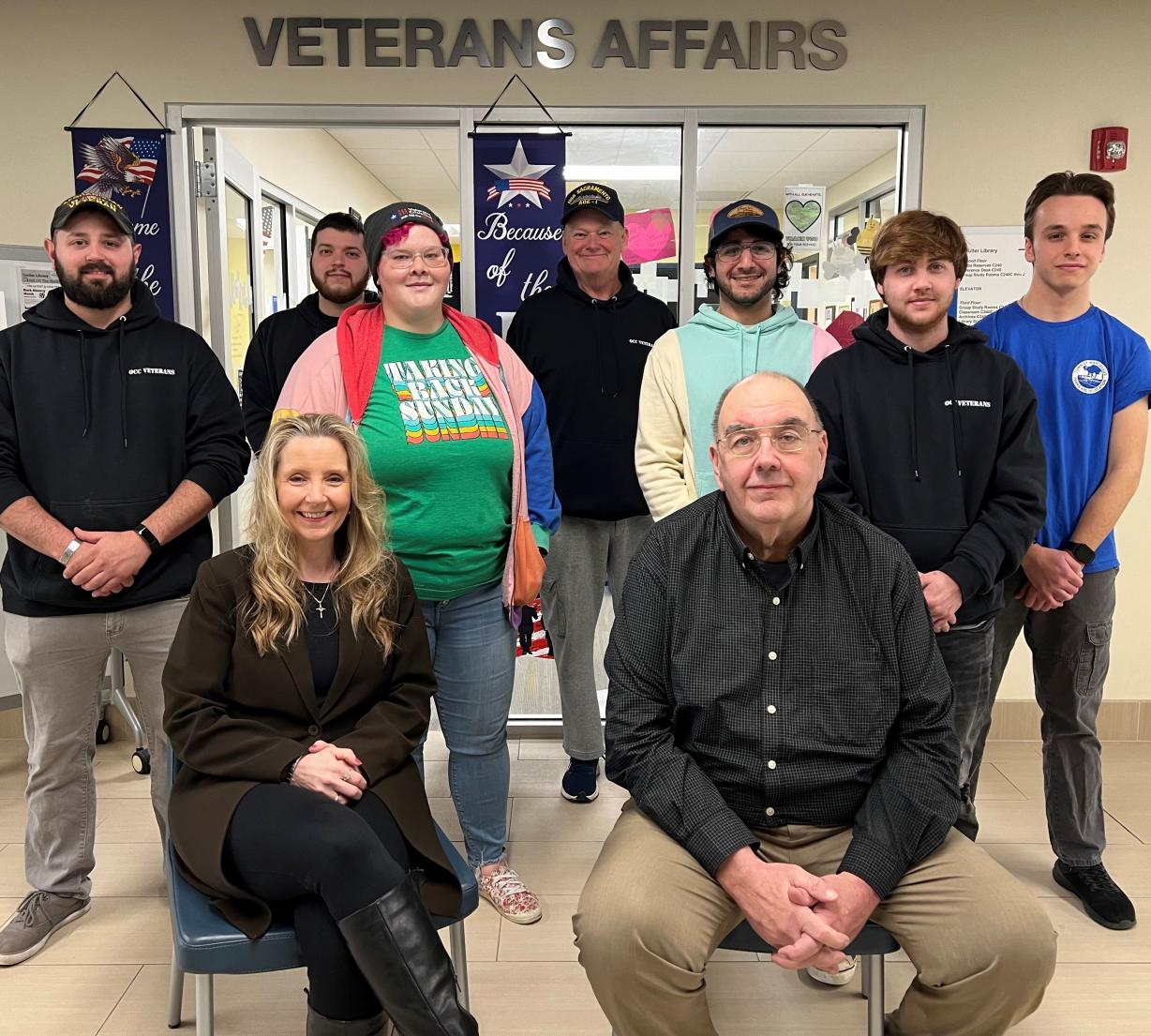 Leading OCC's Office of Veterans and Military Services are (front row) Technical Assistant Erin Elliott and Director Steve White. Behind them are Student Veterans who regularly come to the office on the second floor of Coulter Hall. Leading OCC's Office of Veterans and Military Services are (front row) Technical Assistant Erin Elliott and Director Steve White. Behind them are Student Veterans who regularly come to the office on the second floor of Coulter Hall.