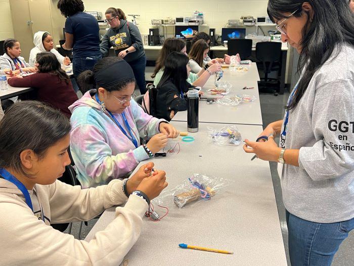 Syracuse City School District 8th grade girls made binary bracelets during Girls Going Tech Espanol on the Onondaga Community College campus. Syracuse City School District 8th grade girls made binary bracelets during Girls Going Tech Espanol on the Onondaga Community College campus.