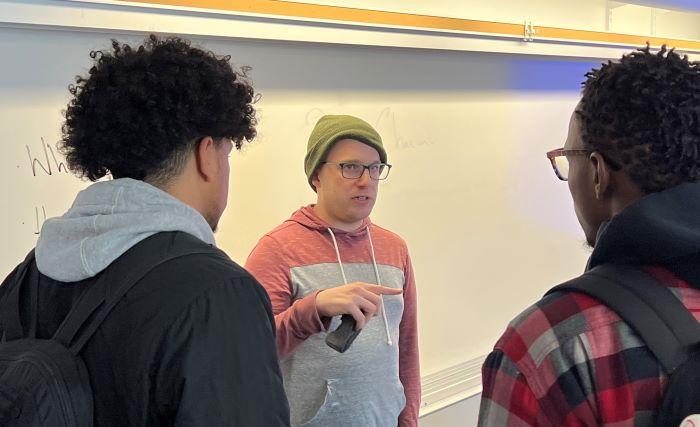 Professor Chris Chriswell has a conversation with students in his Music Appreciation class. Professor Chris Chriswell has a conversation with students in his Music Appreciation class.