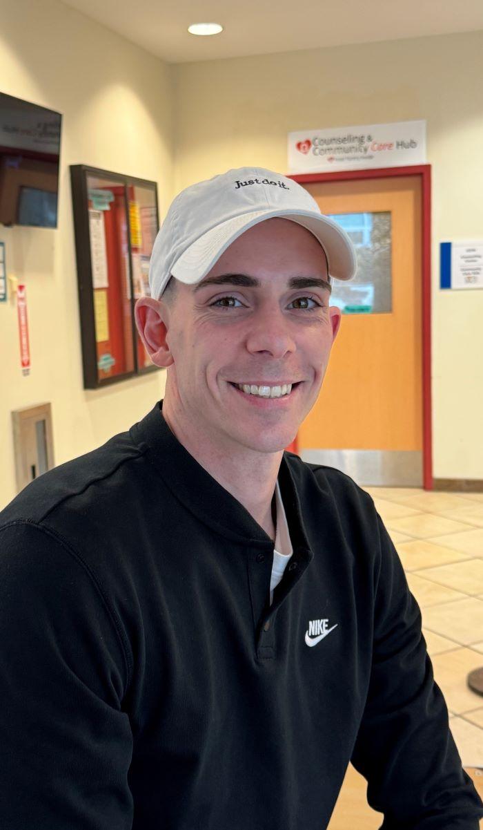 Hunter Yessick is completing his Engineering Science degree this month. He's pictured in front of the Counseling &amp; Community Care Hub which is one of his go-to places on campus.