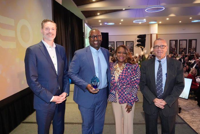 Left to right: CenterState CEO's Rob Simpson, OCC President Dr. Warren Hilton, Wegman's Evelyn Ingram, and OCC Board of Trustees Chair John Sindoni. Left to right: CenterState CEO's Rob Simpson, OCC President Dr. Warren Hilton, Wegman's Evelyn Ingram, and OCC Board of Trustees Chair John Sindoni.