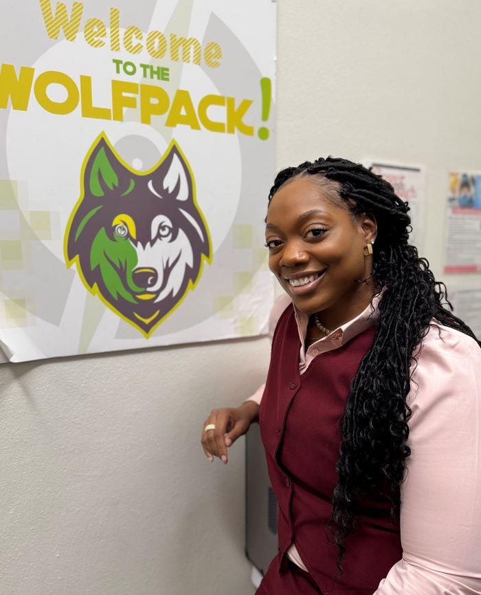 Cassaundra Richardson is a full-time student at Onondaga Community College and the Dean of Students at OnTech Charter High School, where she is pictured.