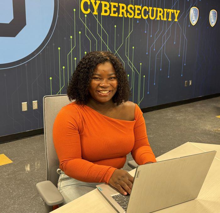 Hawa Giannetto is a 30-year-old mother of four working toward her Cybersecurity degree.