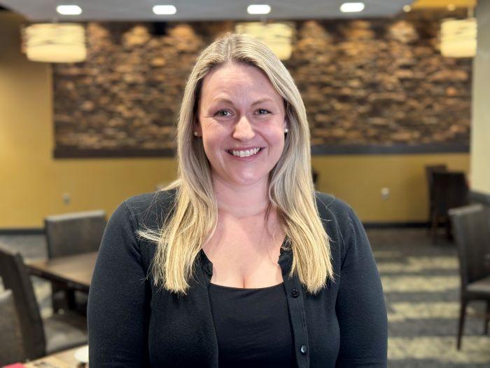 Heather Johnson is General Manager at Gilda's in Skaneateles and a Professor in Onondaga Community College's Culinary Management degree program. She's pictured in OCC's student-run restaurant in the Gordon Student Center.