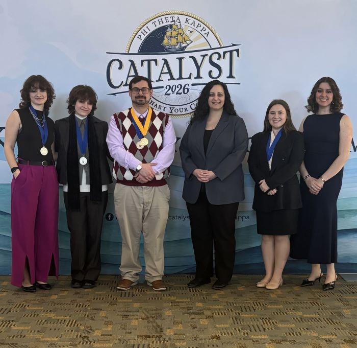 Representing OCC's PTK chapter at the international conference in Baltimore are (left to right): Becca Seargent, Seren Stvan, Phil Impaglia, Dana Acee, Claire Detor, and Elena Villasenor.