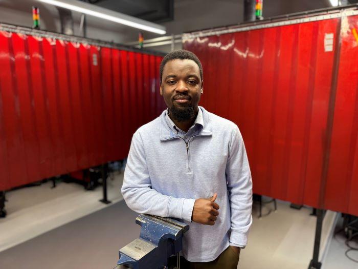 Hassan Musa is a Student Success Navigator in the School of Technology, Engineering &amp; Computing. He's pictured in the Welding Lab in the Whitney Applied Technology Center.