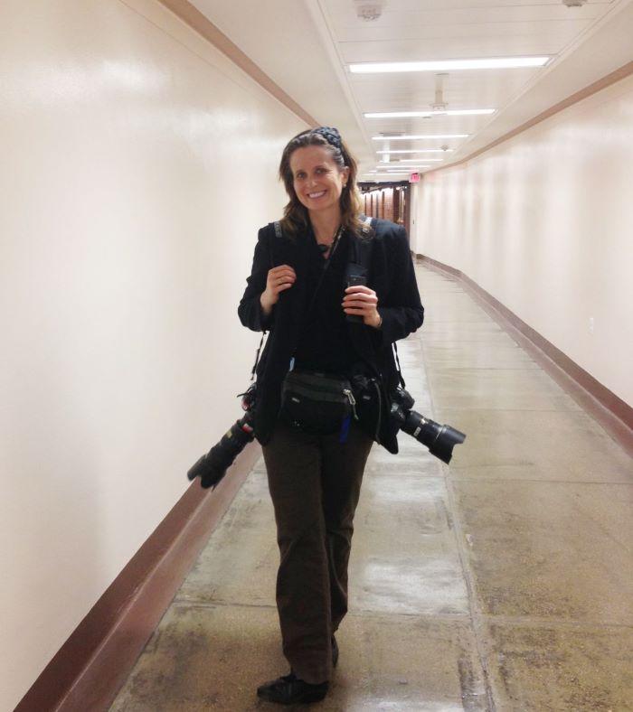 Joy Holder '91 is pictured in the Dirksen Senate Office Building in Washington DC. She documented history as an official U.S. Senate Photographer for parts of four decades.
