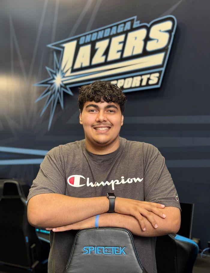Mohammad Alnamrouti is a PSLA at Fowler graduate who is in his first semester at Onondaga Community College. He's pictured in the Esports Arena in the Gordon Student Center.