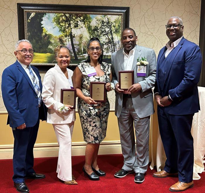 Pictured at the New York Community College Trustees awards are (left to right) OCC Board Chair Jaime Alicea, honoree Melanie Littlejohn, honoree Karinda Shanes '98, honoree Sam Rowser '86, and OCC President Dr. Warren Hilton.