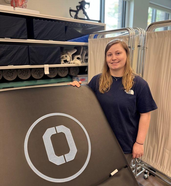Karissa Camp is one of six Onondaga Community College students chosen to receive the Patrick P. Lee Foundation Scholarship. She's pictured in the new Physical Therapist Assistant Lab in Ferrante Hall.