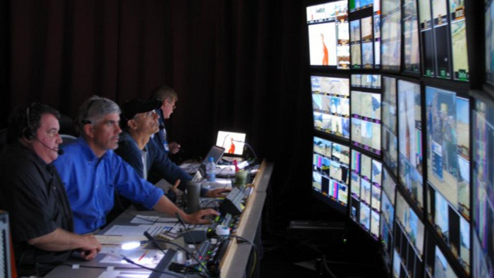 OCC alumnus John &quot;JD&quot; DelVecchio (far left) is an Emmy award-winning director of sports on television.