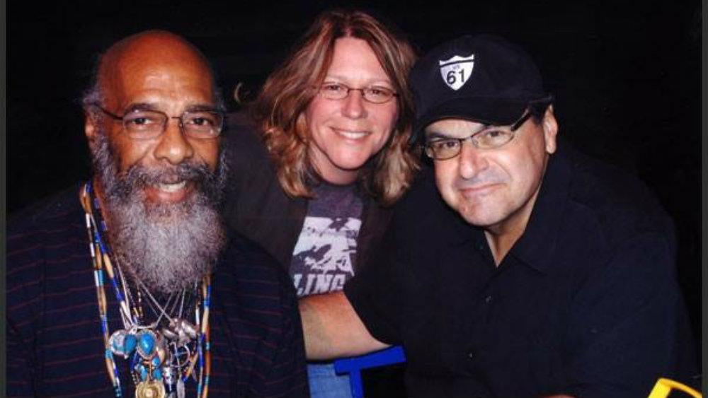 Kathy Rowe (center) with the later Richie Havens (left) and husband and previous Alumni Face Honoree Frank Malfitano '67