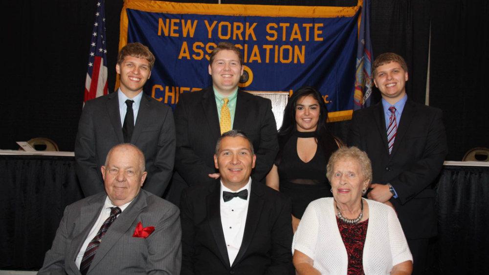 Michael Lefancheck (first row center) with his parents and children after being sworn in as President of the NYS Association of Chiefs of Police last July.