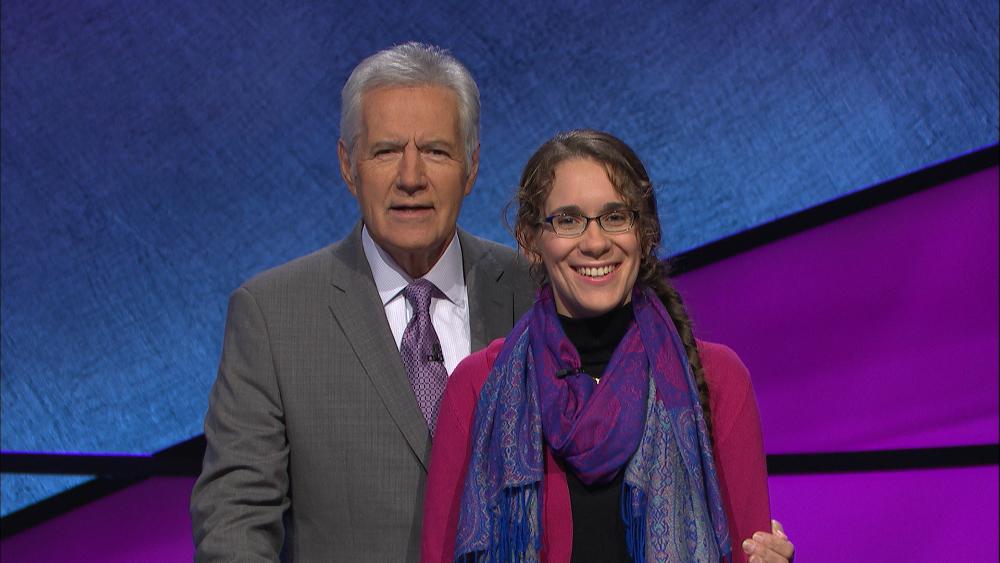 OCC Alumna Ashley O'Mara (right) with Jeopardy host Alex Trebek (left).
