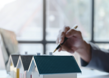 Realtor Reviewing Houses
